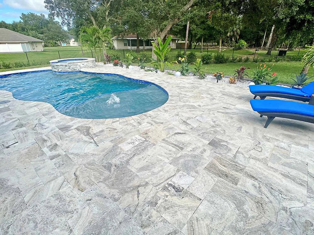 TRAVERTINE & MARBLE DECKS + PATIOS