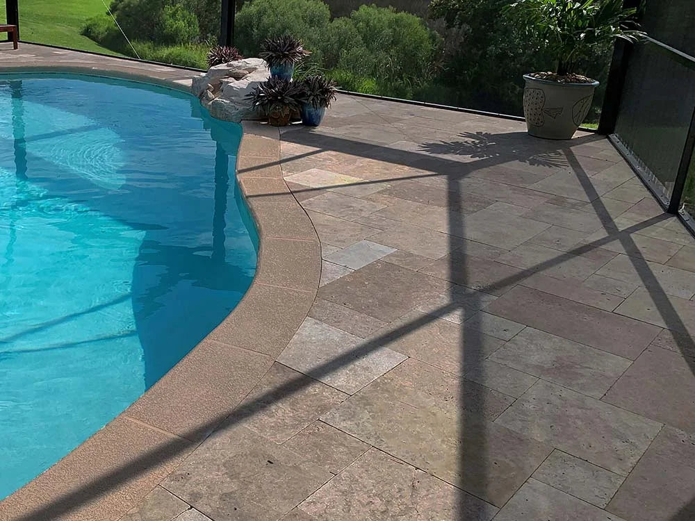 TRAVERTINE & MARBLE DECKS + PATIOS