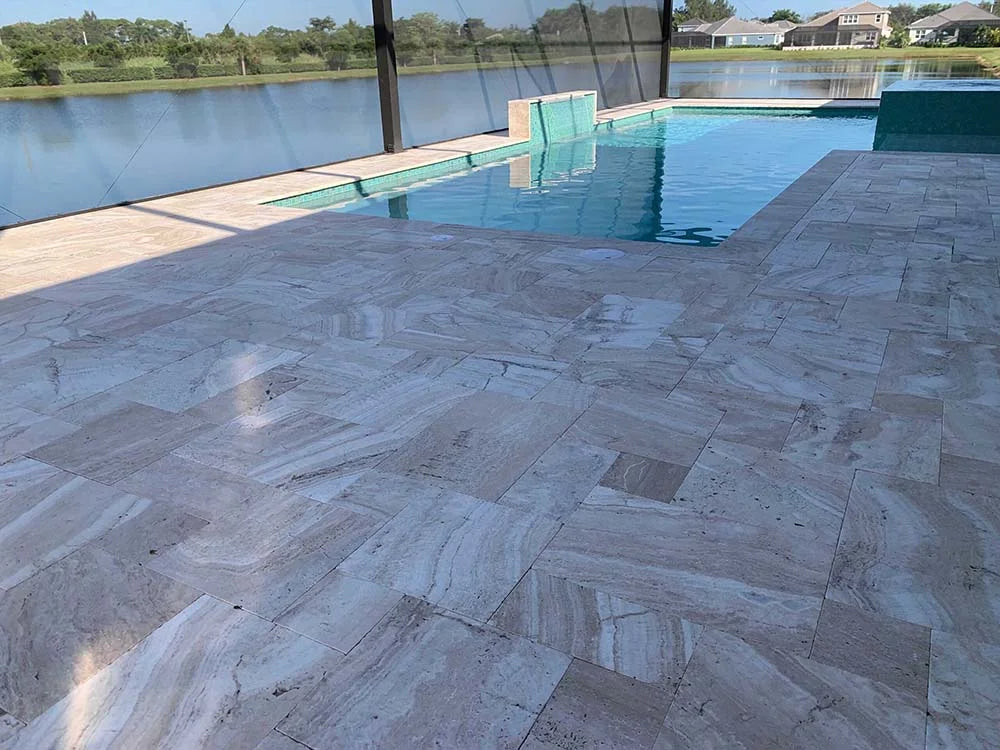 TRAVERTINE & MARBLE DECKS + PATIOS