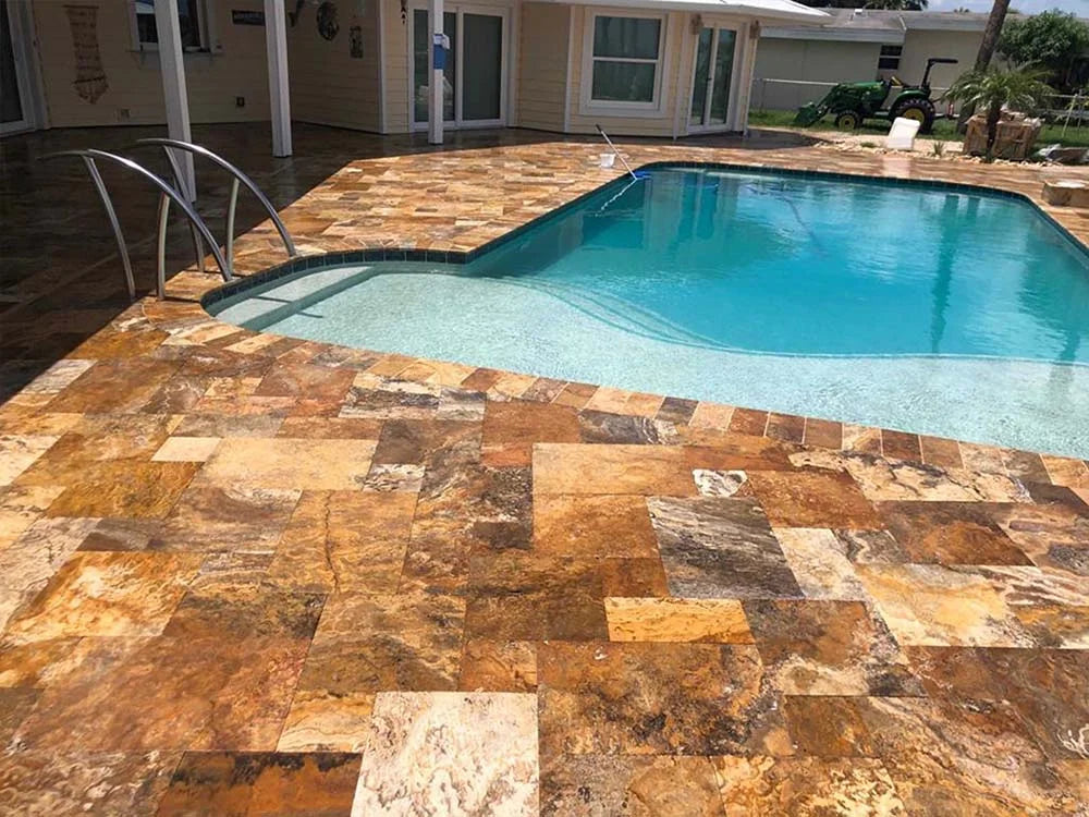TRAVERTINE & MARBLE DECKS + PATIOS