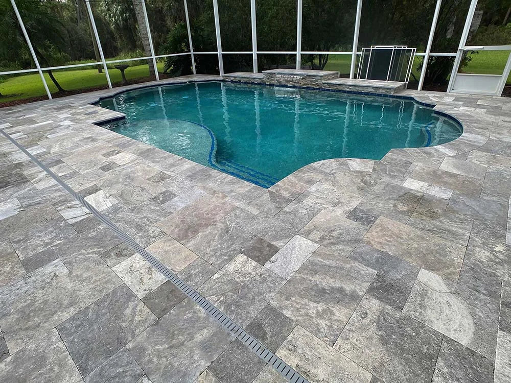 TRAVERTINE & MARBLE DECKS + PATIOS