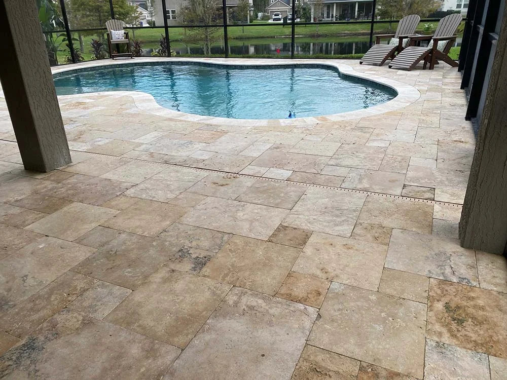TRAVERTINE & MARBLE DECKS + PATIOS