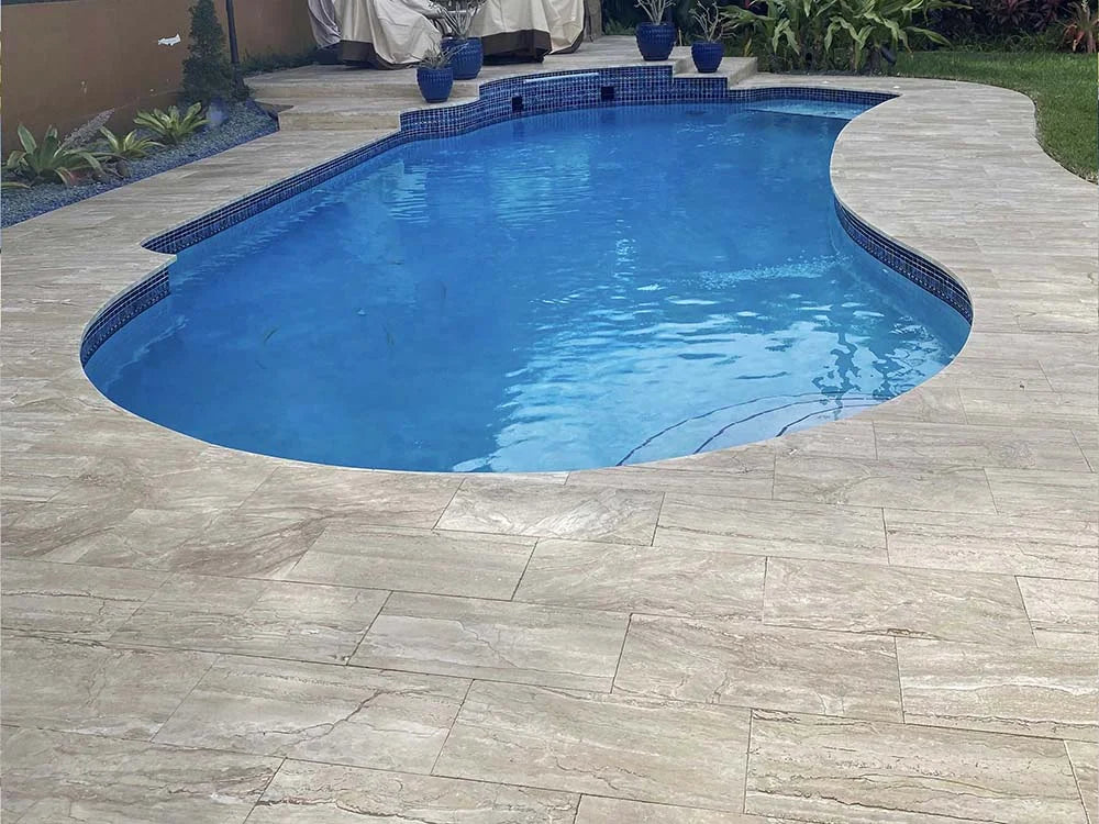 TRAVERTINE & MARBLE DECKS + PATIOS