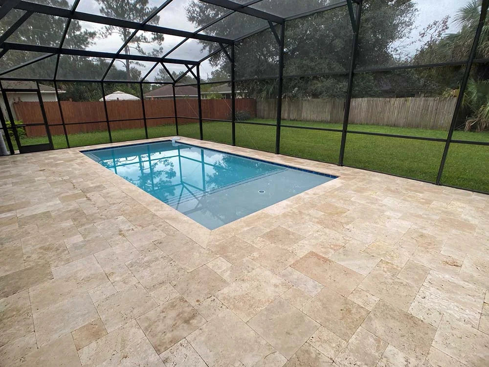 TRAVERTINE & MARBLE DECKS + PATIOS