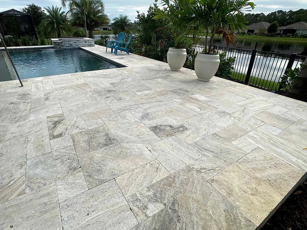 TRAVERTINE & MARBLE DECKS + PATIOS